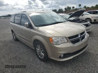 2014 Dodge Grand Caravan SXT 30th Anniversary with VIN 2C4RDGCG2ER328126, listed as a Copart auction lot 74277684 with Not Provided miles and Salvage Title. Bid and sale history available at DreamBid. Image 4.
