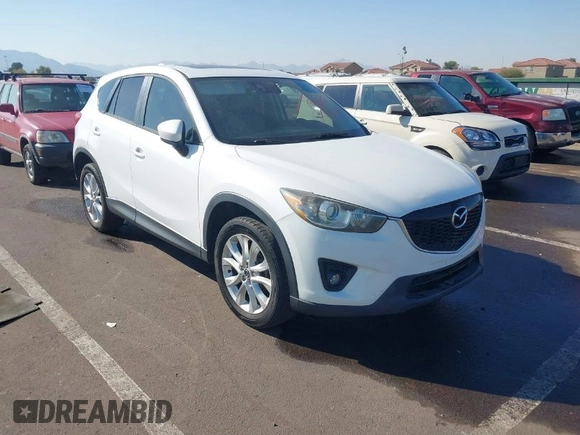 2014 Mazda CX-5 Grand Touring with VIN JM3KE4DY4E0375809, listed as a IAAI auction lot 41468078 with 151,226 mi miles. Bid and sale history available at carsss.com. Image 1.
