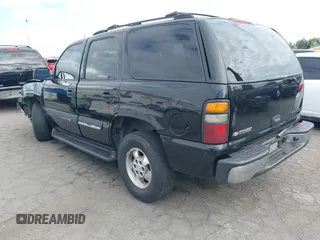 2005 Chevrolet Tahoe Z71 with VIN 1GNEC13TX5R145310, listed as a IAAI auction lot 42056793 with 159,002 mi miles and . Bid and sale history available at DreamBid. Image 3.