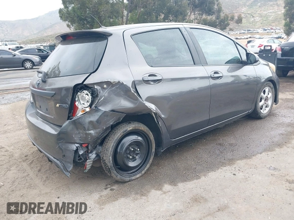 2013 Toyota Yaris L with VIN JTDKTUD34DD547878, listed as a IAAI auction lot 42108444 with 241,269 mi miles. Bid and sale history available at carsss.com. Image 4.