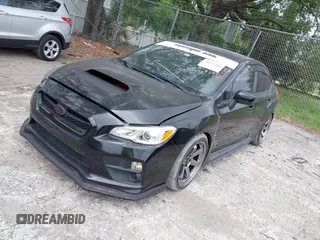 2016 Subaru WRX with VIN JF1VA1B65G9801044, listed as a IAAI auction lot 41973939 with 82,420 mi miles. Bid and sale history available at carsss.com. Image 17.