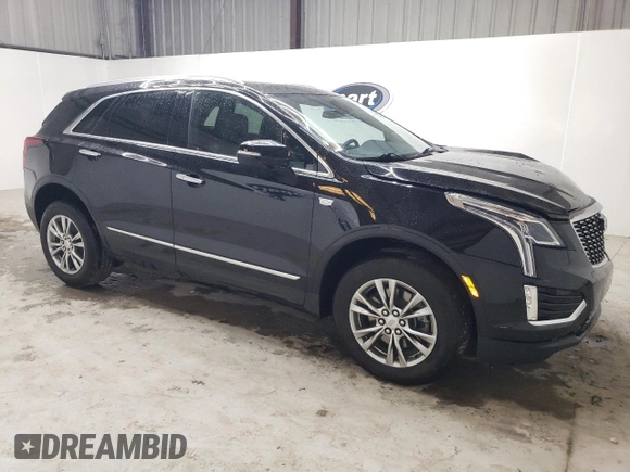 2023 Cadillac XT5 FWD Premium Luxury with VIN 1GYKNCRS6PZ171335, listed as a Copart auction lot 51859385 with 52,691 mi miles and Clean Title. Bid and sale history available at carsss.com. Image 4.
