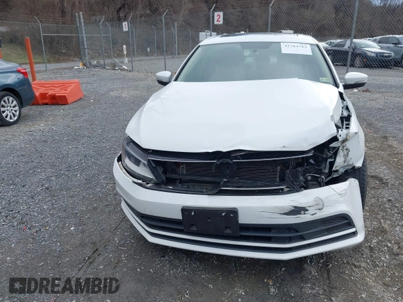 2016 Volkswagen Jetta Sedan 1.4T SE with VIN 3VWD67AJ3GM392427, listed as a IAAI auction lot 41704763 with 84,152 mi miles. Bid and sale history available at carsss.com. Image 12.