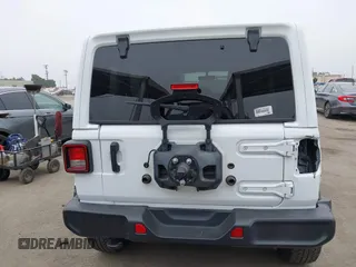 2023 Jeep Wrangler Sahara with VIN 1C4HJXEG5PW581632, listed as a IAAI auction lot 42462622 with 24,550 mi miles and . Bid and sale history available at DreamBid. Image 16.