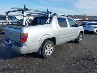 2006 Honda Ridgeline RTL with VIN 2HJYK165X6H570027, listed as a IAAI auction lot 41868389 with 207,020 mi miles. Bid and sale history available at carsss.com. Image 4.