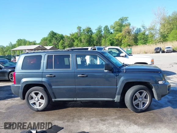 2008 Jeep Patriot Sport z VIN 1J8FT28WX8D519480, wystawiony jako IAAI lot #42119775 z przebiegiem 162 594 mil mil oraz . Historia ofert i sprzedaży dostępna na DreamBid. Obrazek 14.