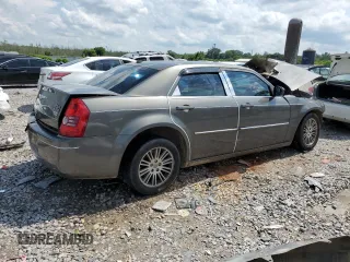 2009 Chrysler 300 Touring with VIN 2C3KA53V49H621930, listed as a Copart auction lot 58125004 with 346,358 mi miles and Salvage Title. Bid and sale history available at carsss.com. Image 3.