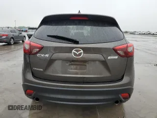 2016 Mazda CX-5 Grand Touring with VIN JM3KE2DY4G0811386, listed as a Copart auction lot 51961795 with 99,525 mi miles and Salvage Title. Bid and sale history available at carsss.com. Image 6.