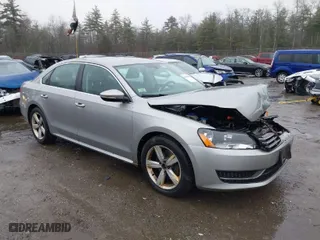 2012 Volkswagen Passat SE w/Sunroof with VIN 1VWBP7A35CC081714, listed as a IAAI auction lot 41864409 with 152,603 mi miles. Bid and sale history available at carsss.com. Image 1.