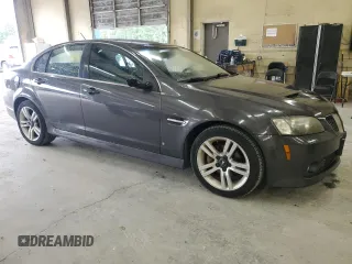 2009 Pontiac G8 z VIN 6G2ER57769L192376, wystawiony jako Copart lot #58634365 z przebiegiem 206 095 mil mil oraz Tytuł czysty. Historia ofert i sprzedaży dostępna na DreamBid. Obrazek 4.