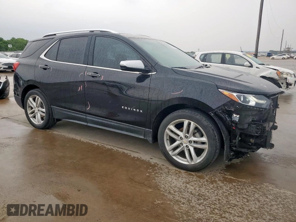 2021 Chevrolet Equinox Premier z VIN 2GNAXNEV9M6136701, wystawiony jako Copart lot #57288215 z przebiegiem 62 808 mil mil oraz Szkoda całkowita • Salvage title. Historia ofert i sprzedaży dostępna na DreamBid. Obrazek 4.
