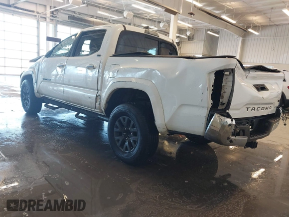 2020 Toyota Tacoma SR5 with VIN 3TMAZ5CN5LM124703, listed as a IAAI auction lot 41017478 with 47,627 mi miles and . Bid and sale history available at DreamBid. Image 3.