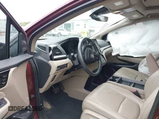 2021 Honda Odyssey Touring with VIN 5FNRL6H88MB006938, listed as a IAAI auction lot 42367022 with 63,280 mi miles and . Bid and sale history available at DreamBid. Image 5.