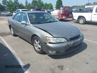 1998 Lexus ES 300 with VIN JT8BF28G3W5031533, listed as a IAAI auction lot 42132801 with 243,178 mi miles and . Bid and sale history available at DreamBid. Image 1.