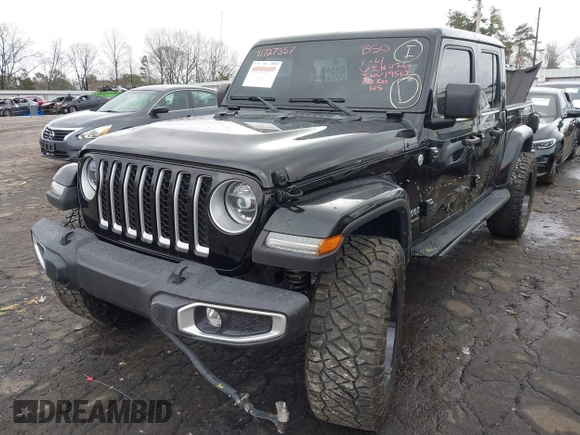 2022 Jeep Gladiator High Altitude z VIN 1C6HJTFG1NL164764, wystawiony jako IAAI lot #41727357 z przebiegiem 28 222 mil mil oraz . Historia ofert i sprzedaży dostępna na DreamBid. Obrazek 19.