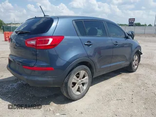 2012 Kia Sportage LX with VIN KNDPB3A2XC7179136, listed as a IAAI auction lot 42298343 with 206,303 mi miles and . Bid and sale history available at DreamBid. Image 4.