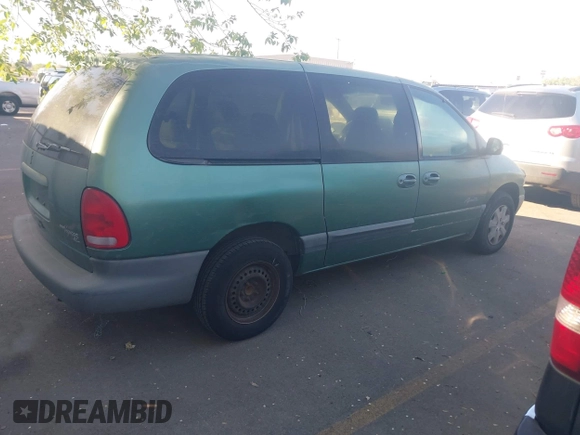1999 Plymouth Voyager Grand SE z VIN 2P4GP44G1XR180660, wystawiony jako IAAI lot #42149571 z przebiegiem Nie podano mil oraz . Historia ofert i sprzedaży dostępna na DreamBid. Obrazek 4.