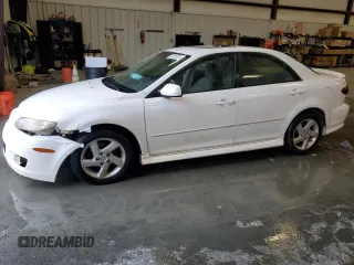 2004 Mazda 6 i with VIN 1YVFP80CX45N43521, listed as a Copart auction lot 73315234 with 182,697 mi miles and Salvage Title. Bid and sale history available at DreamBid. Image 1.