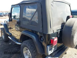 2000 Jeep Wrangler Sport with VIN 1J4FA49S8YP749547, listed as a IAAI auction lot 41861030 with 110,186 mi miles and . Bid and sale history available at DreamBid. Image 3.