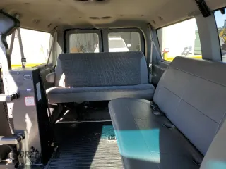2002 Ford Econoline Passenger XL with VIN 1FMRE11LX2HB04681, listed as a Copart auction lot 60885454 with 114,665 mi miles and Salvage title. Bid and sale history available at DreamBid. Image 10.