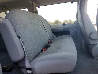 2010 Ford Econoline Passenger XL with VIN 1FMNE1BW3ADA25124, listed as a Copart auction lot 56899235 with 244,010 mi miles and Salvage title. Bid and sale history available at DreamBid. Image 11.