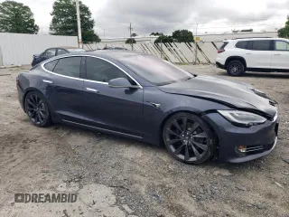 2020 Tesla Model S Long Range with VIN 5YJSA1E24LF360335, listed as a Copart auction lot 57947265 with 50,672 mi miles and Clean title. Bid and sale history available at DreamBid. Image 4.