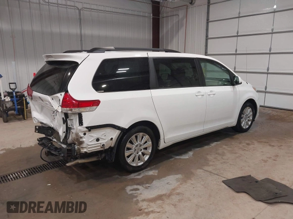 2013 Toyota Sienna LE with VIN 5TDJK3DC2DS049479, listed as a IAAI auction lot 41322671 with 108,436 mi miles and . Bid and sale history available at DreamBid. Image 4.