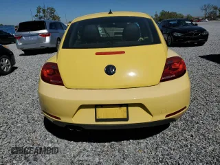 2012 Volkswagen Beetle 2.5L PZEV with VIN 3VWJP7AT0CM628771, listed as a Copart auction lot 47974775 with 70,940 mi miles and Salvage Title. Bid and sale history available at carsss.com. Image 6.