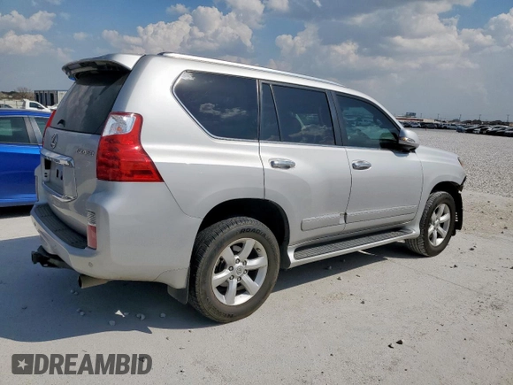 2010 Lexus GX 460 Premium with VIN JTJJM7FXXA5017699, listed as a Copart auction lot 50470045 with 185,063 mi miles and Salvage title. Bid and sale history available at DreamBid. Image 3.