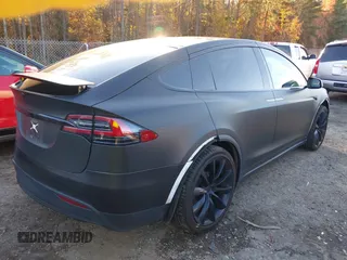 2020 Tesla Model X Long Range with VIN 5YJXCDE28LF298553, listed as a IAAI auction lot 40863184 with 54,031 mi miles and . Bid and sale history available at DreamBid. Image 4.