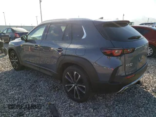 2023 Mazda CX-50 Premium Plus z VIN 7MMVABEY3PN106534, wystawiony jako Copart lot #68754472 z przebiegiem 4 110 mil mil oraz . Historia ofert i sprzedaży dostępna na DreamBid. Obrazek 2.