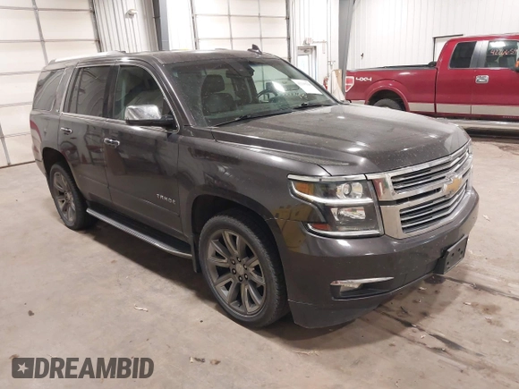 2016 Chevrolet Tahoe LTZ with VIN 1GNSKCKC1GR201155, listed as a IAAI auction lot 42235228 with 184,585 mi miles and . Bid and sale history available at DreamBid. Image 1.