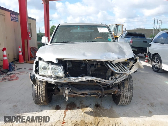 2006 Lexus LX 470 z VIN JTJHT00W864014757, wystawiony jako IAAI lot #42332814 z przebiegiem 131 641 mil mil oraz . Historia ofert i sprzedaży dostępna na DreamBid. Obrazek 13.