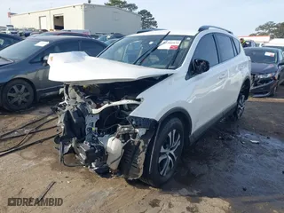 2017 Toyota RAV4 LE with VIN JTMZFREV8HJ721753, listed as a IAAI auction lot 41286036 with 119,246 mi miles. Bid and sale history available at carsss.com. Image 2.