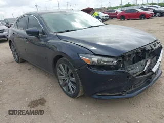 2019 Mazda 6 Touring with VIN JM1GL1VM7K1507773, listed as a IAAI auction lot 42085213 with 59,589 mi miles. Bid and sale history available at carsss.com. Image 1.