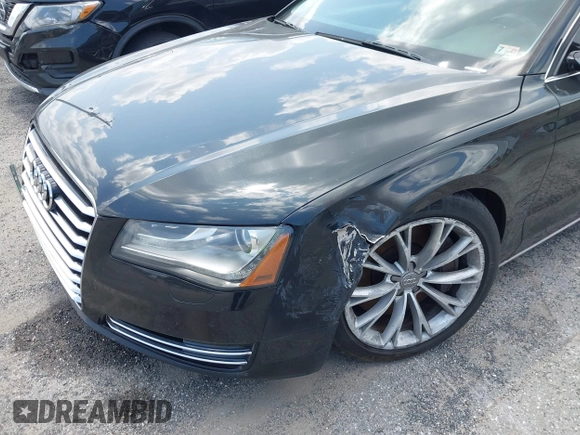 2012 Audi A8 with VIN WAURVAFD2CN002071, listed as a IAAI auction lot 42778424 with Not provided miles and . Bid and sale history available at DreamBid. Image 6.