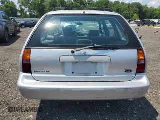 1998 Ford Escort SE with VIN 3FAFP15P4WR240362, listed as a Copart auction lot 63453095 with 220,855 mi miles and Salvage title. Bid and sale history available at DreamBid. Image 6.