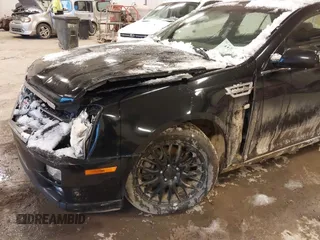 2010 Cadillac STS AWD with VIN 1G6DU6EV2A0125065, listed as a IAAI auction lot 41229886 with 84,954 mi miles and . Bid and sale history available at DreamBid. Image 12.