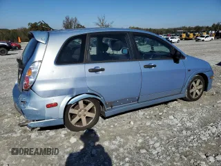 2006 Suzuki Aerio Premium z VIN JS2RC62H265351885, wystawiony jako Copart lot #80825134 z przebiegiem 147 053 mil mil oraz Szkody całkowita. Historia ofert i sprzedaży dostępna na DreamBid. Obrazek 3.
