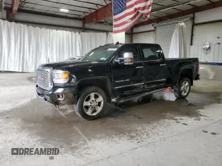 2016 GMC Sierra 2500HD Denali z VIN 1GT12UE84GF275611, wystawiony jako Copart lot #52740225 z przebiegiem 135 747 mil mil oraz Szkoda całkowita • Salvage title. Historia ofert i sprzedaży dostępna na DreamBid. Obrazek 1.
