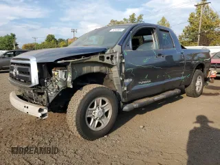 2010 Toyota Tundra 4WD Truck with VIN 5TFUY5F14AX145459, listed as a Copart auction lot 74345954 with 209,054 mi miles and Salvage Title. Bid and sale history available at carsss.com. Image 1.