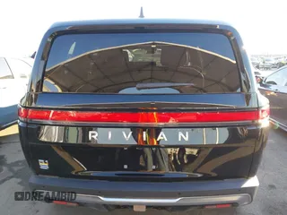 2024 Rivian R1S Adventure with VIN 7PDSGABAXRN034598, listed as a IAAI auction lot 41312180 with 23,615 mi miles. Bid and sale history available at carsss.com. Image 17.