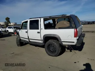 1997 GMC Suburban with VIN 3GKFK16R1VG507044, listed as a Copart auction lot 87302674 with 193,670 mi miles and Salvage Title. Bid and sale history available at carsss.com. Image 2.