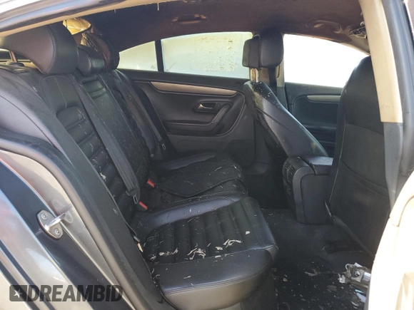 2013 Volkswagen CC Sport with VIN WVWBP7ANXDE525051, listed as a Copart auction lot 70659744 with 293,611 mi miles and Salvage Title. Bid and sale history available at DreamBid. Image 11.