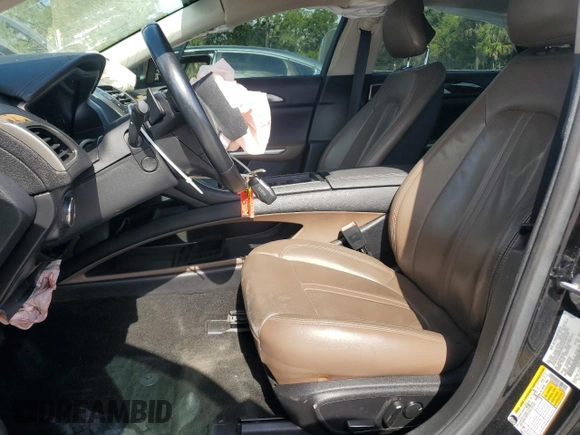 2016 Lincoln MKZ with VIN 3LN6L2J96GR601042, listed as a Copart auction lot 57807955 with 102,191 mi miles and Salvage title. Bid and sale history available at DreamBid. Image 7.
