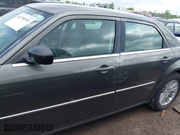 2009 Chrysler 300 LX with VIN 2C3KA43D49H558006, listed as a IAAI auction lot 42178195 with 208,864 mi miles and . Bid and sale history available at DreamBid. Image 15.