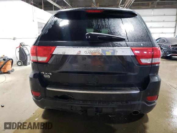2013 Jeep Grand Cherokee Overland with VIN 1C4RJFCG7DC646348, listed as a Copart auction lot 49526415 with 137,889 mi miles and Clean Title. Bid and sale history available at carsss.com. Image 6.