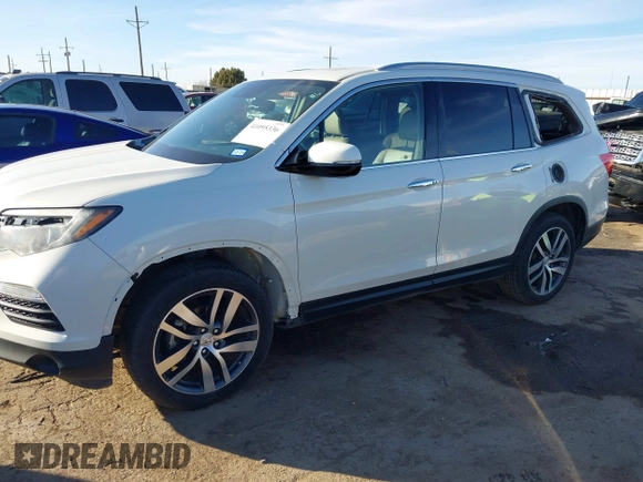 2017 Honda Pilot Touring with VIN 5FNYF6H93HB056387, listed as a IAAI auction lot 41095336 with 90,376 mi miles and . Bid and sale history available at DreamBid. Image 6.