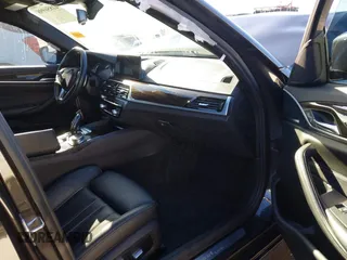 2017 BMW 5 Series 530i with VIN WBAJA5C39HG894097, listed as a IAAI auction lot 41856998 with 89,329 mi miles and . Bid and sale history available at carsss.com. Image 5.