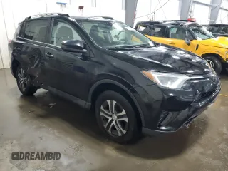 2017 Toyota RAV4 LE with VIN 2T3BFREV3HW617738, listed as a Copart auction lot 58712515 with 117,310 mi miles and Salvage title. Bid and sale history available at DreamBid. Image 4.